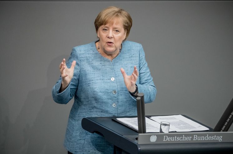 Bundeskanzlerin Angela Merkel (CDU) spricht bei der Plenarsitzung des Deutschen Bundestages im Reichstagsgebäude. 