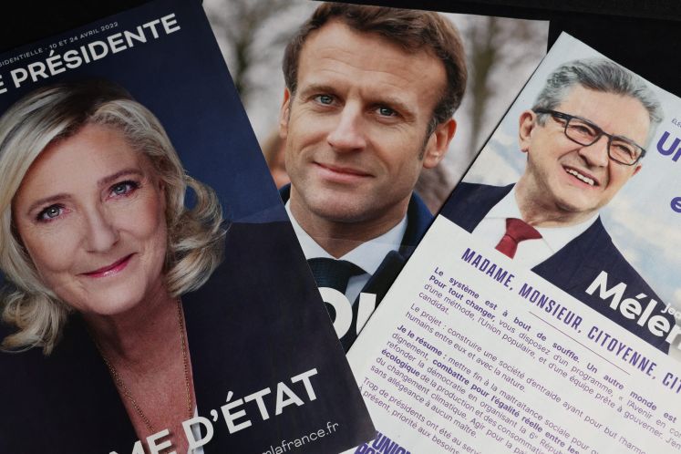 Wahlplakate von Marine Le Pen, Emmanuel Macron und Jean-Luc Mélenchon