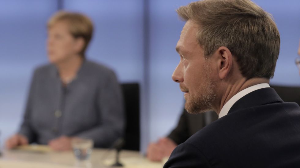Christian Lindner und Angela Merkel in einer Talkshow