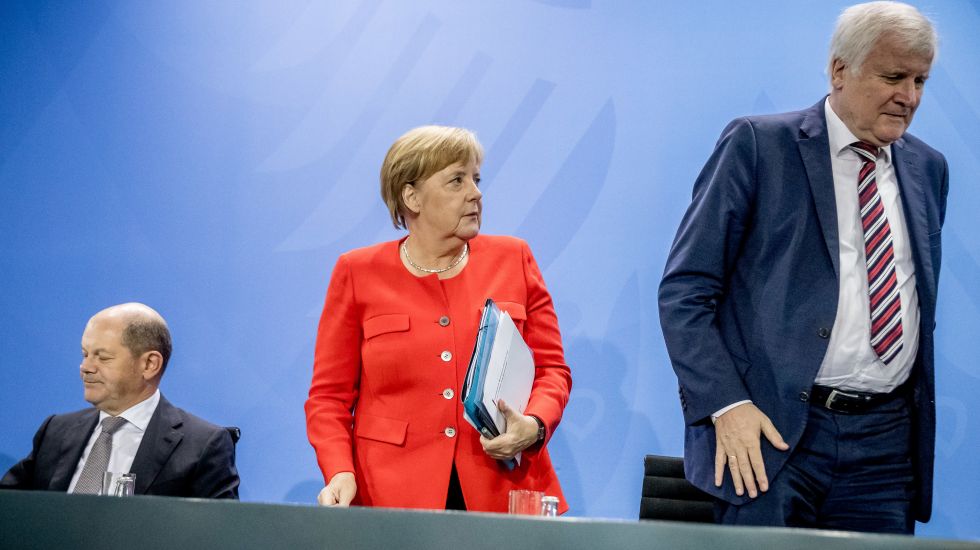 Scholz, Merkel und Seehofer